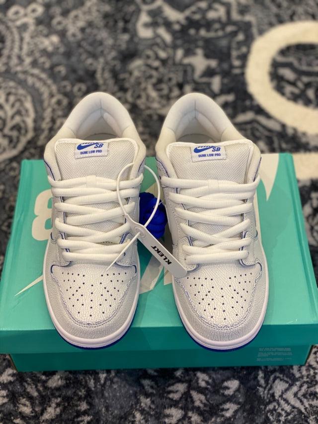 Tênis Nike Dunk SB Low “Premium White Game Royal”